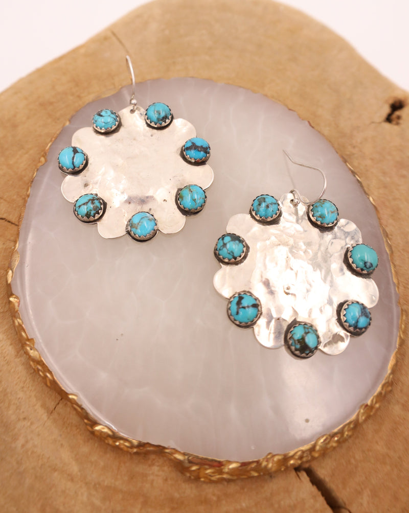 Hammered sterling silver earrings in the shape of scallop with 7 turquoise rounds on each