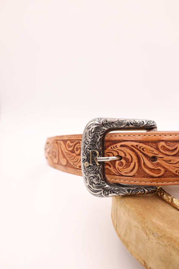 R. Watson Men's belt with leather floral tooling on the front and brown suede on the majority of the back of the belt. The brown suede is bordered with tan leather