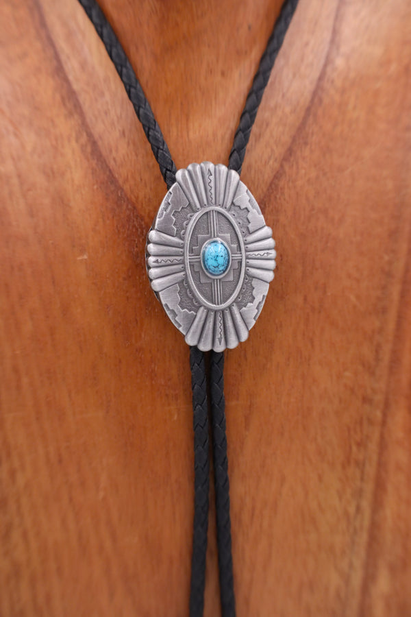 ANTIQUE CONCHO WITH TURQUOISE STONE BOLO
