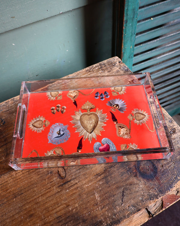 Acrylic tray with orange background and hearts all over