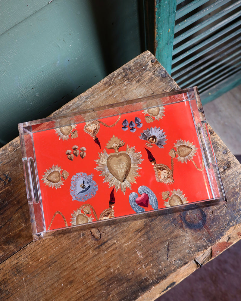 Acrylic tray with orange background and hearts all over