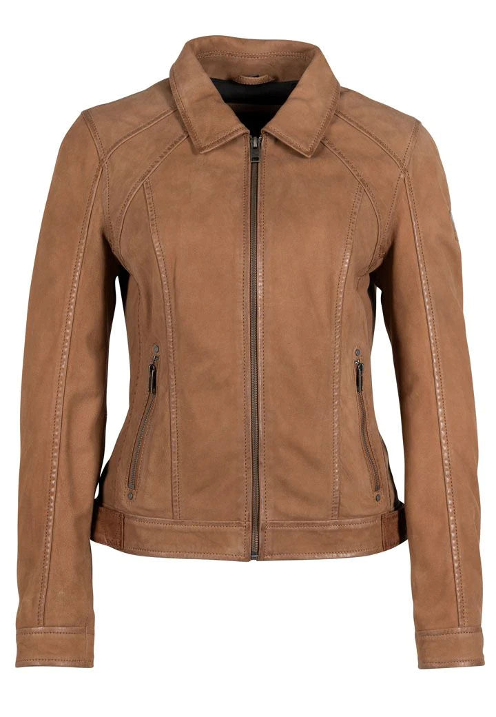 Woman wearing tan leather jacket with neutral sun design on the back
