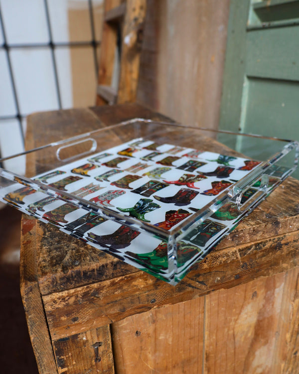 Acrylic tray with variety of graphic cowboy boots all over