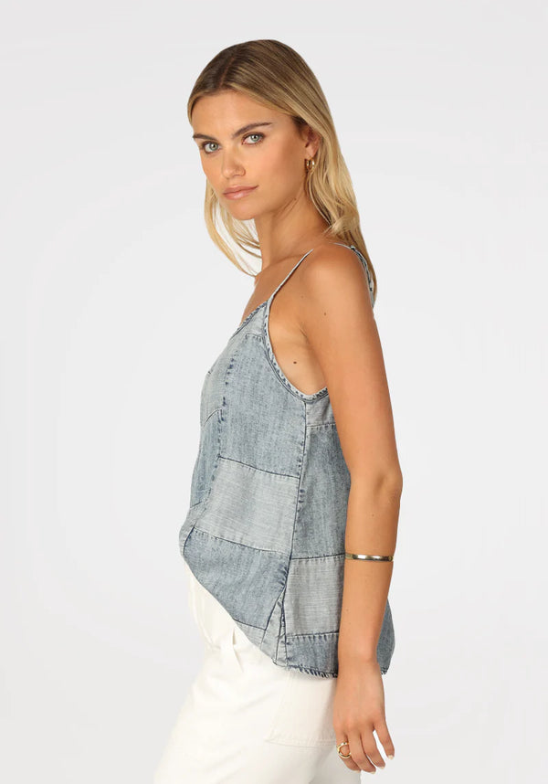 Woman wearing denim cami with patchwork all over