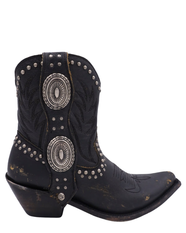 Black cowboy bootie with studs, conchos and distressed leather all over