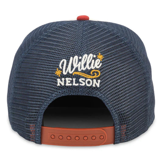 Back of hat has navy mesh, red snap feature with embroidery "Willie Nelson" in white with yellow stars