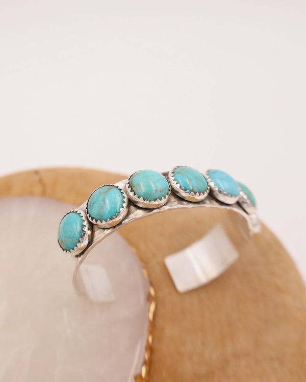 RICHARD SCHMIDT 7 TURQUOISE ROUNDS CUFF