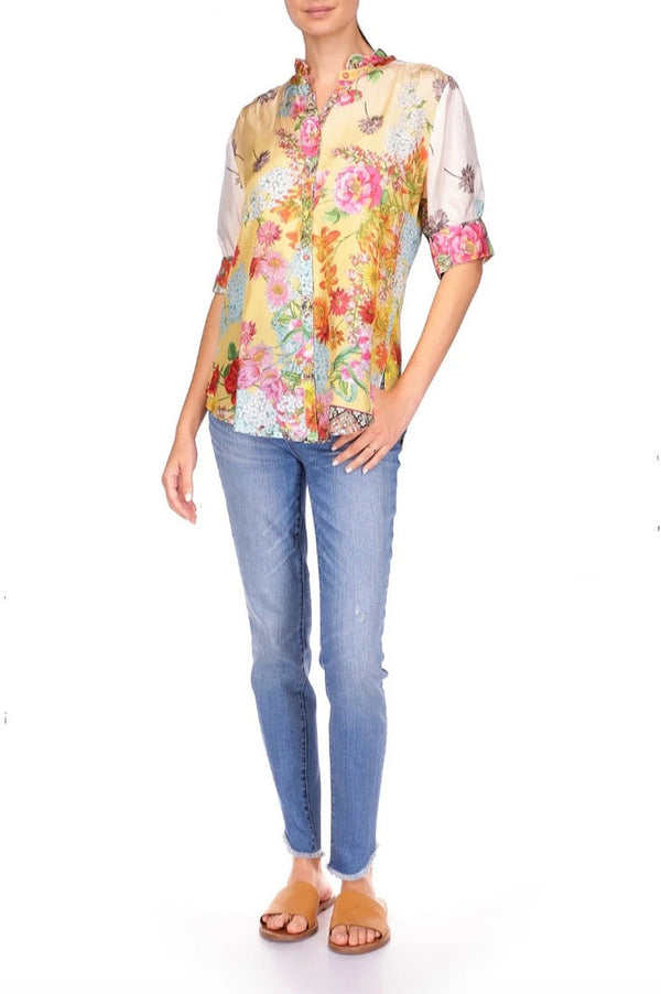 Blouse made from luxurious silk, this vibrant and bright short sleeve blouse is adorned with a beautiful floral print