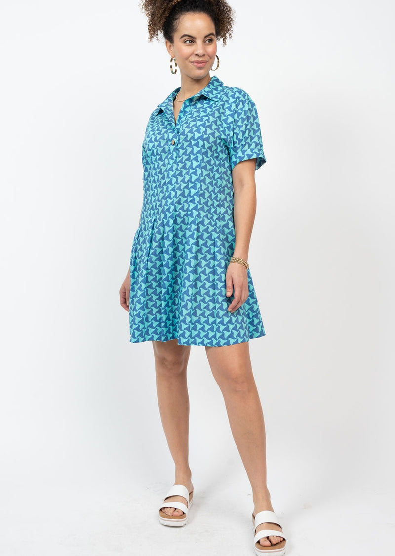 Woman in short sleeve dress with mini cut and wave pattern