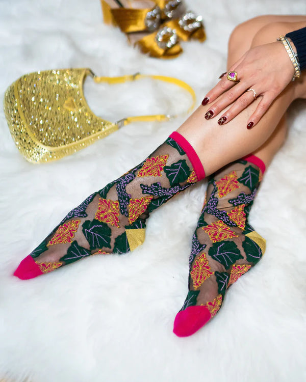 Sheer fashion sock with leaves and ornate embroidery all over