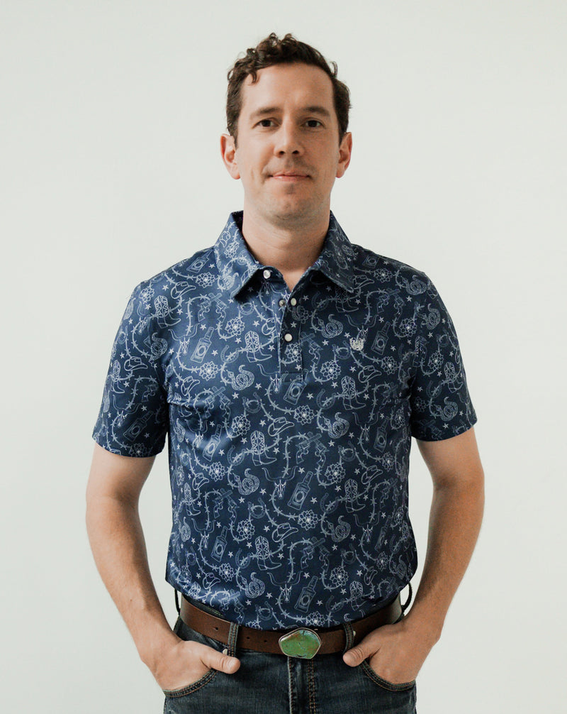 Man wearing short sleeve polo with various western icons all over