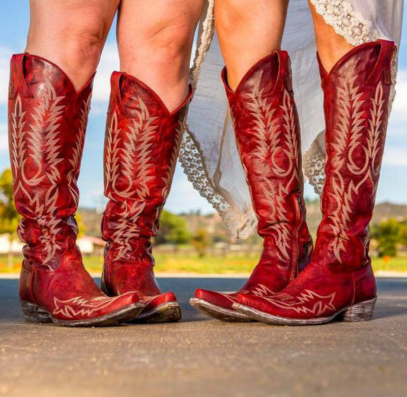 two pairs of OLD GRINGO WOMEN'S MAYRA RED RELAXED BOOT worn by 2 models