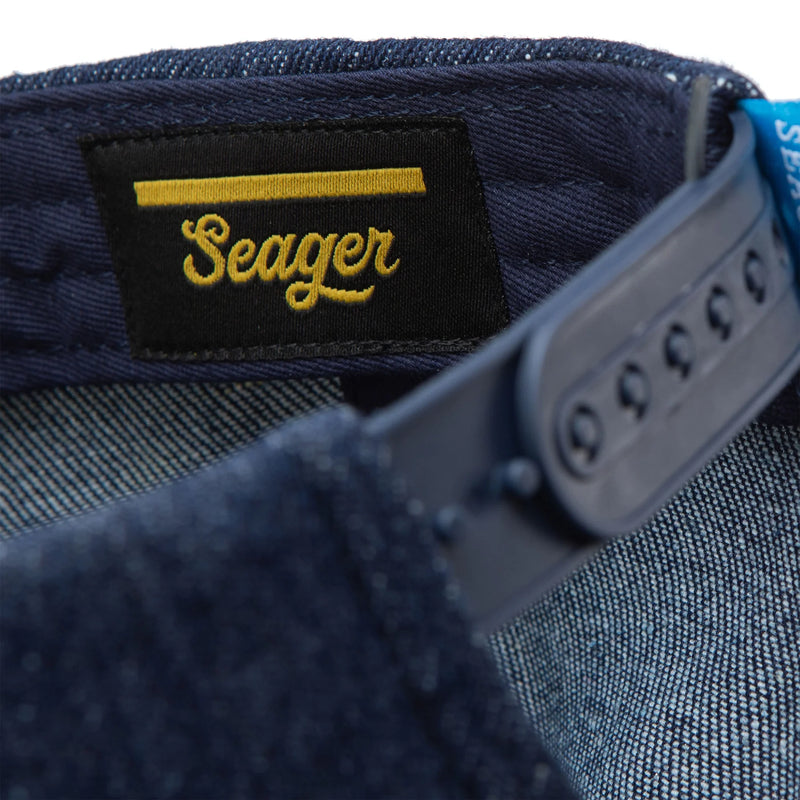Denim ball cap with patch that says "Seager Work & Western Wear"