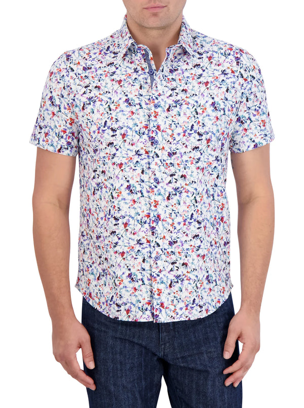 Man wearing short sleeve button front shirt with assorted flowers throughout