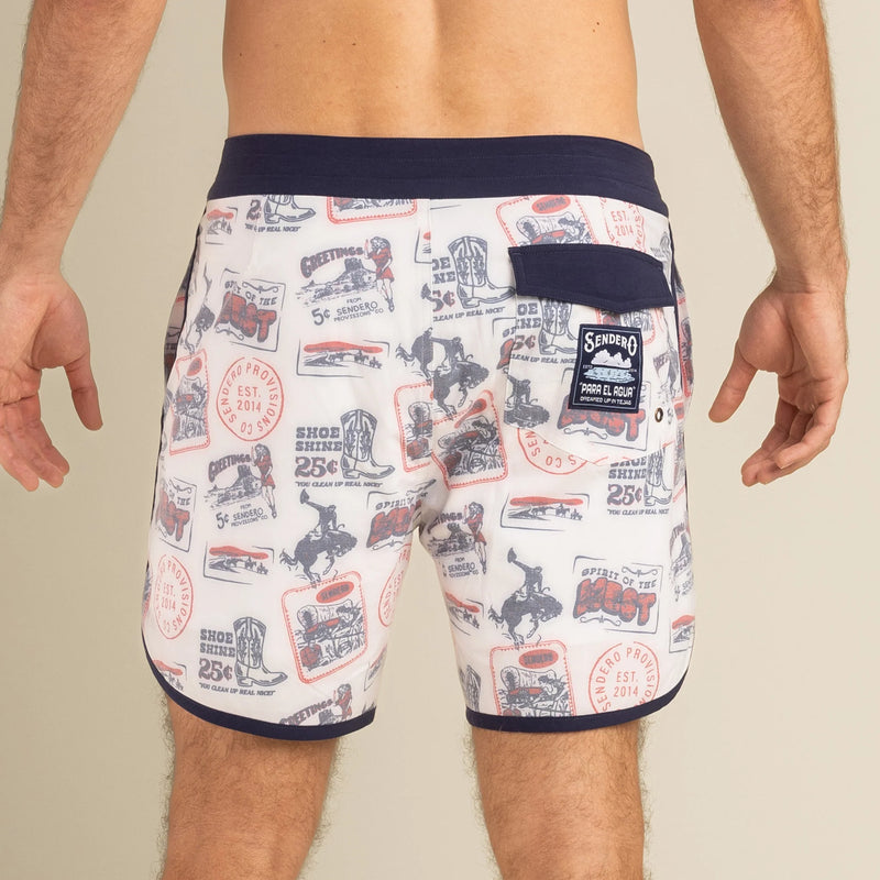 Men's board shorts with cartoon images of western postcard icons all over