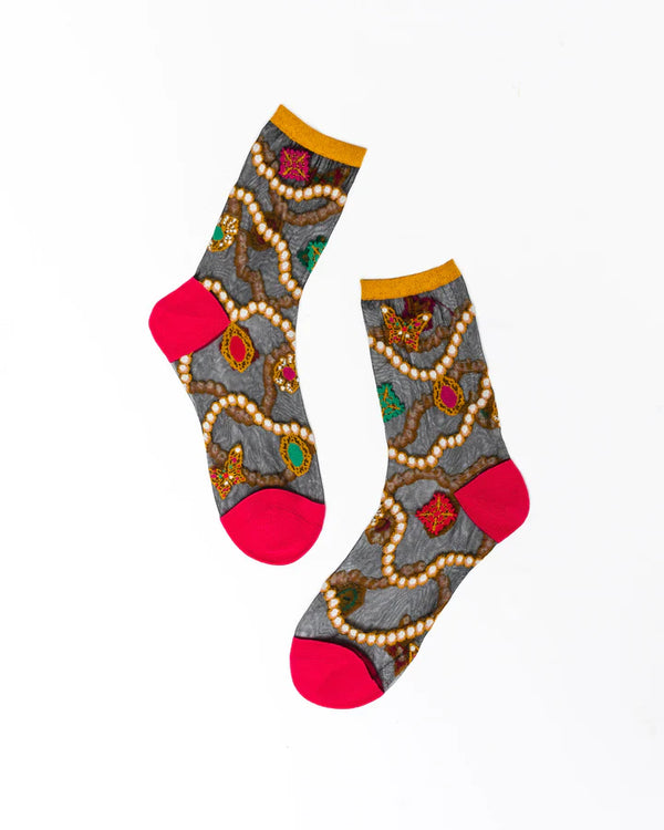 Fashion sock with transparent black fabric with pearls and jewels throughout 