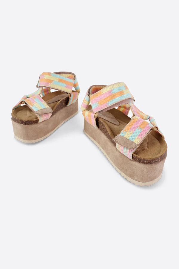 Platform strappy thick sandal in a pink, orange, blue and yellow colorway