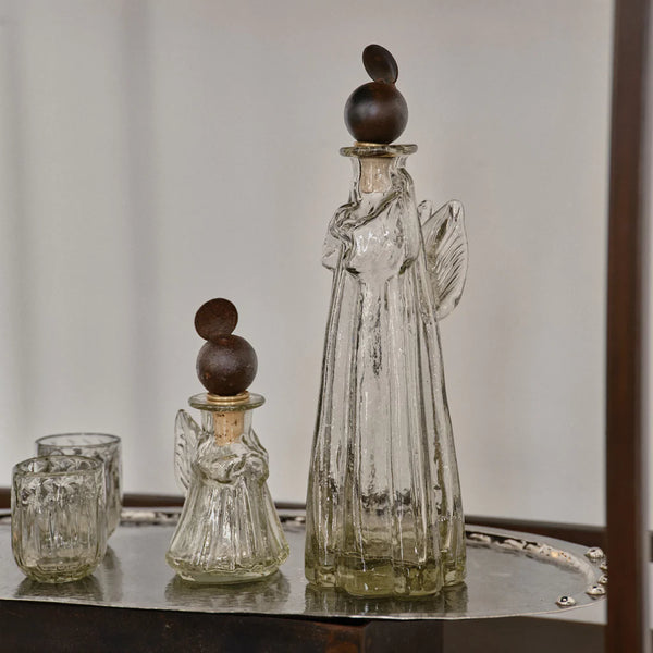 Small mouthblown glass decanter with angel topper