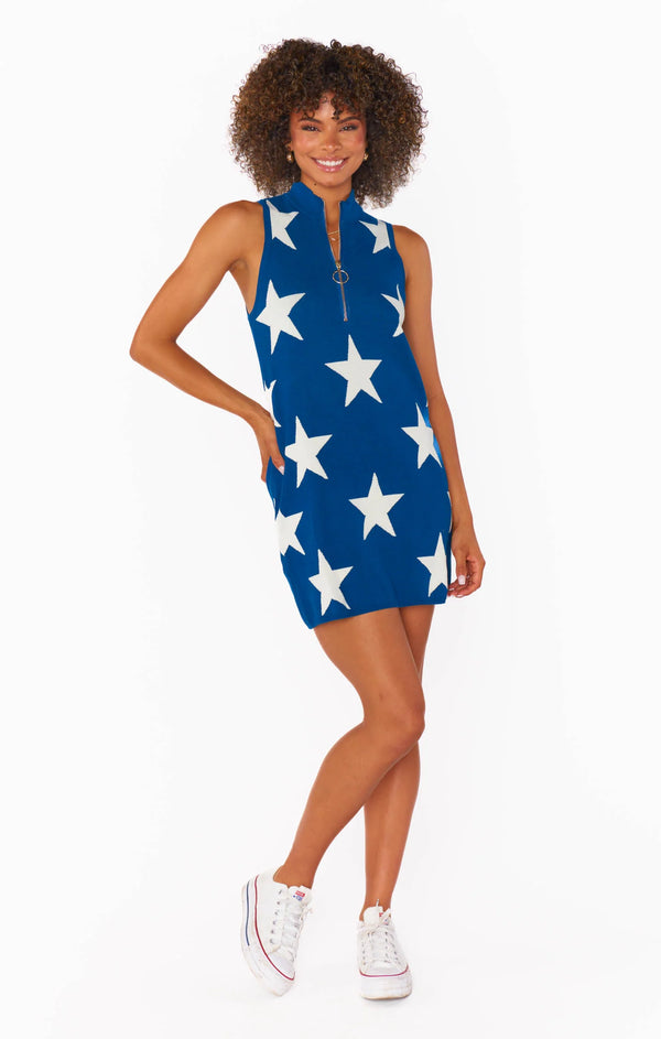 Navy dress with white stars all over with quarter zip neck 