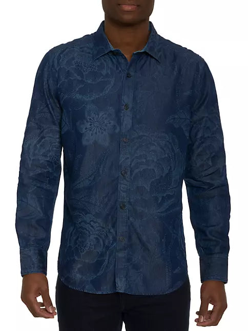 Man wearing denim blue long sleeve dress shirt with subtle floral print all over
