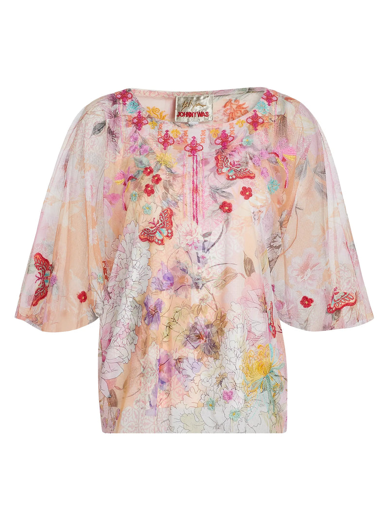 Floral and butterfly patterned blouse on a white background