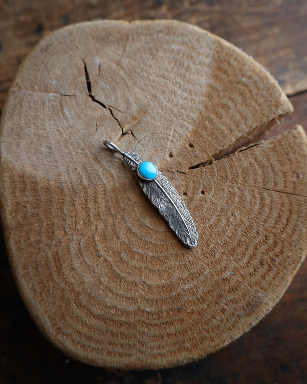 LOVE TOKENS STERLING SILVER FEATHER WITH TURQUOISE PENDANT