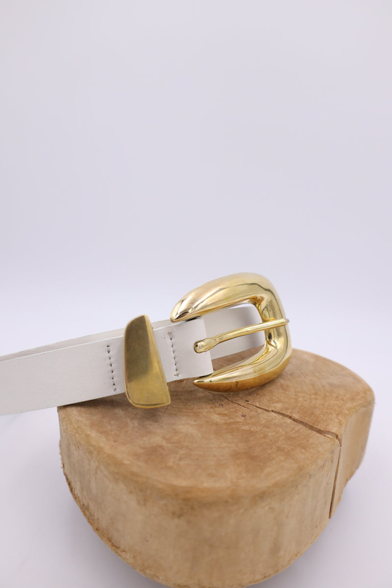 White leather belt with gold hardware and buckle