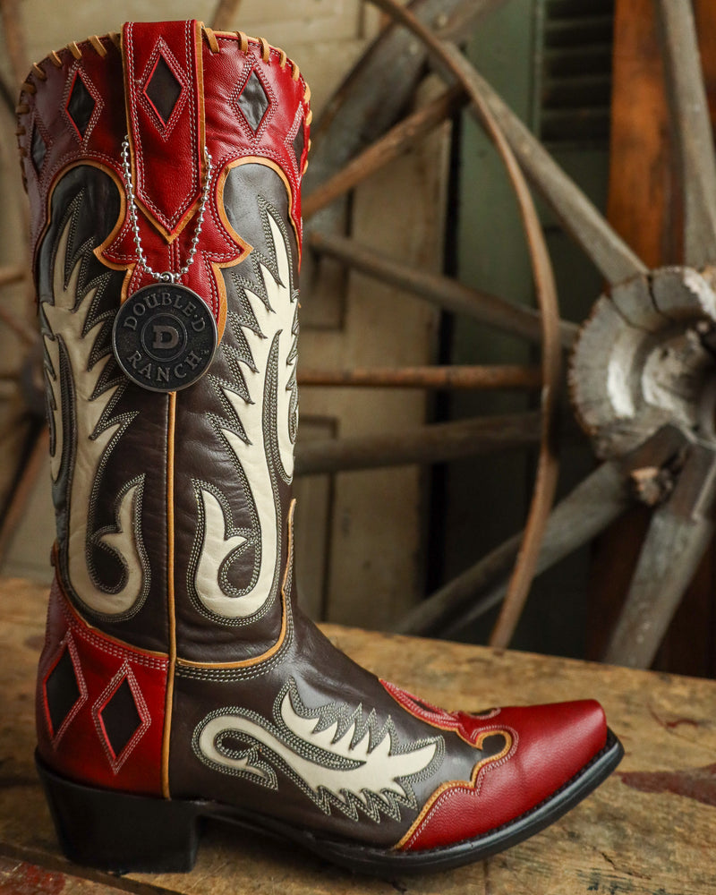 Decorative cowboy boot with intricate patterns on a rustic background