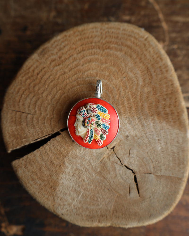 Coreen Cordova Indian Head On Orange Pendant 