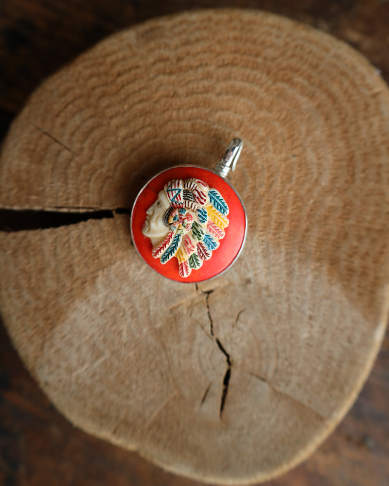 Coreen Cordova Indian Head On Orange Pendant 