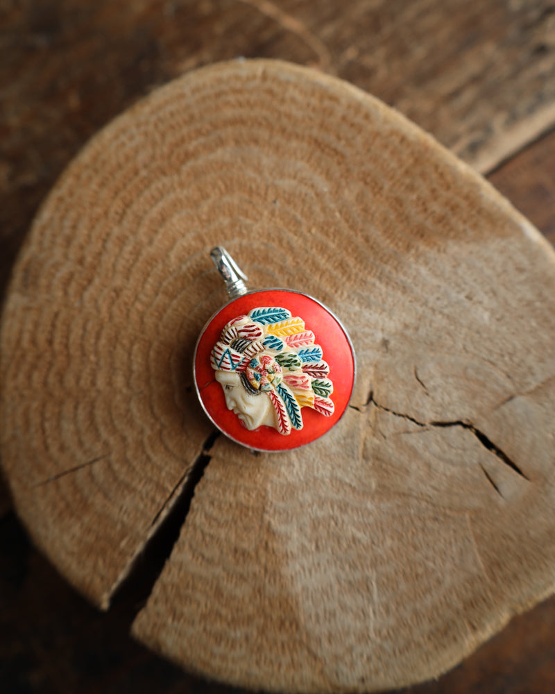 Coreen Cordova Indian Head On Orange Pendant 