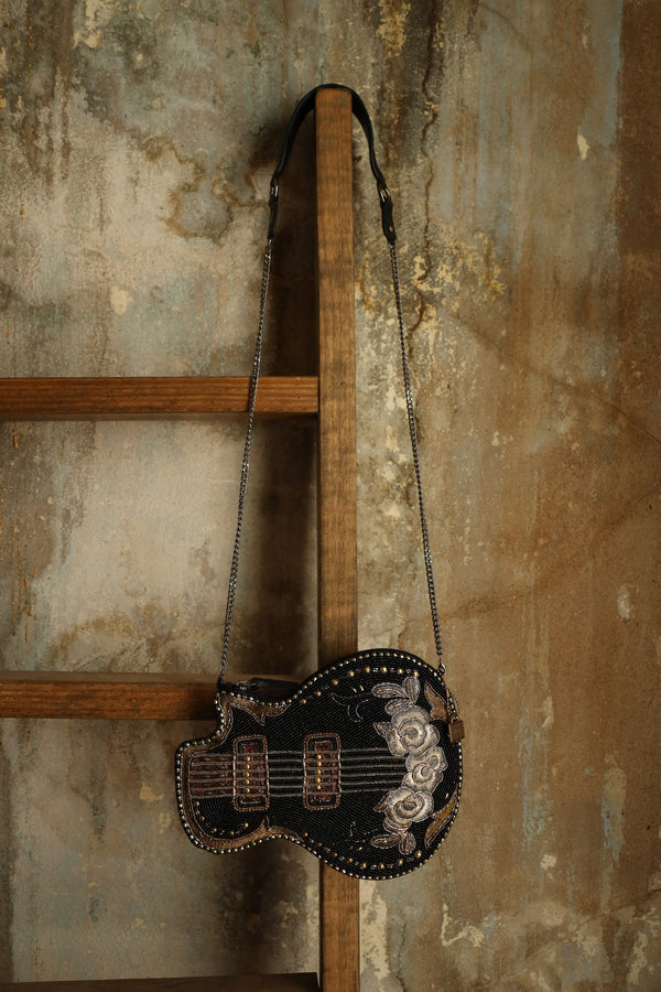 Hand beaded black electric guitar crossbody purse with gold accents with embroidered flowers on the base