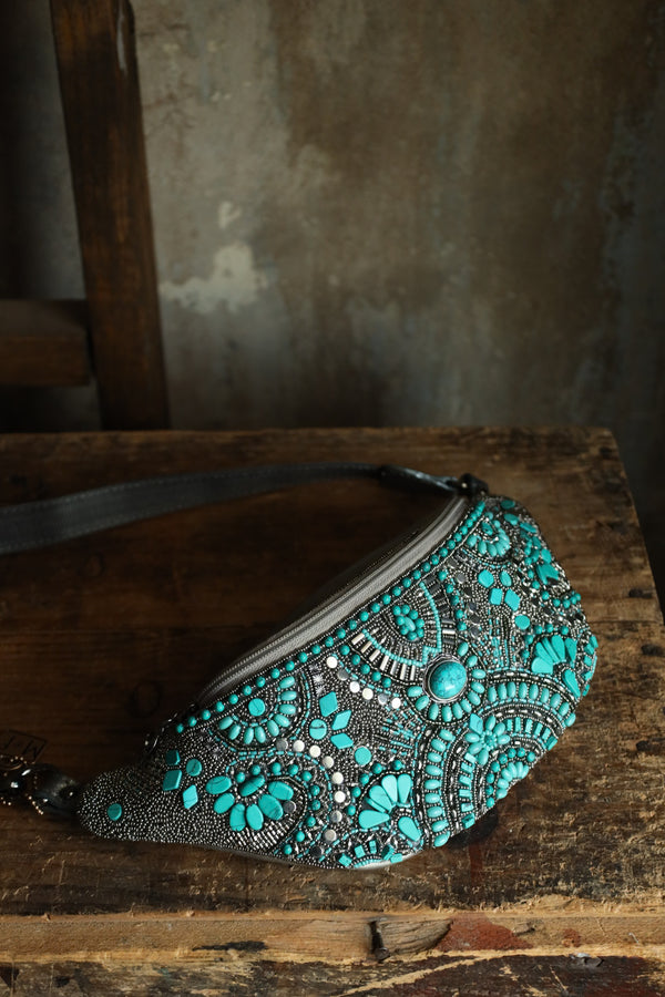 Beaded belt bag with turquoise, grey and stud beads all over the bag