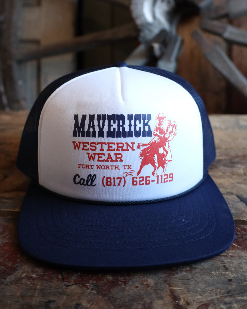 Trucker hat with Maverick Western Wear branding on a wooden surface