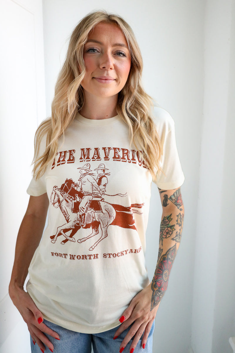 Woman wearing a 'The Maverick' t-shirt with a graphic of a person on a horse.