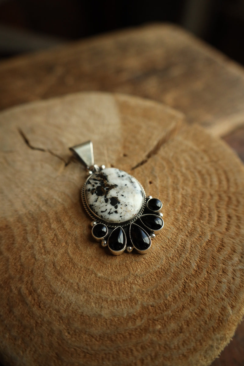 Round White Buffalo 2 Onyx Pendant
