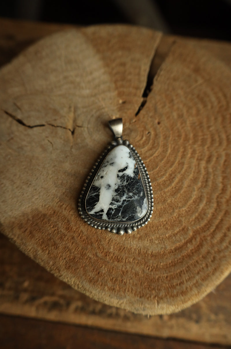 White Buffalo Triangle Pendant