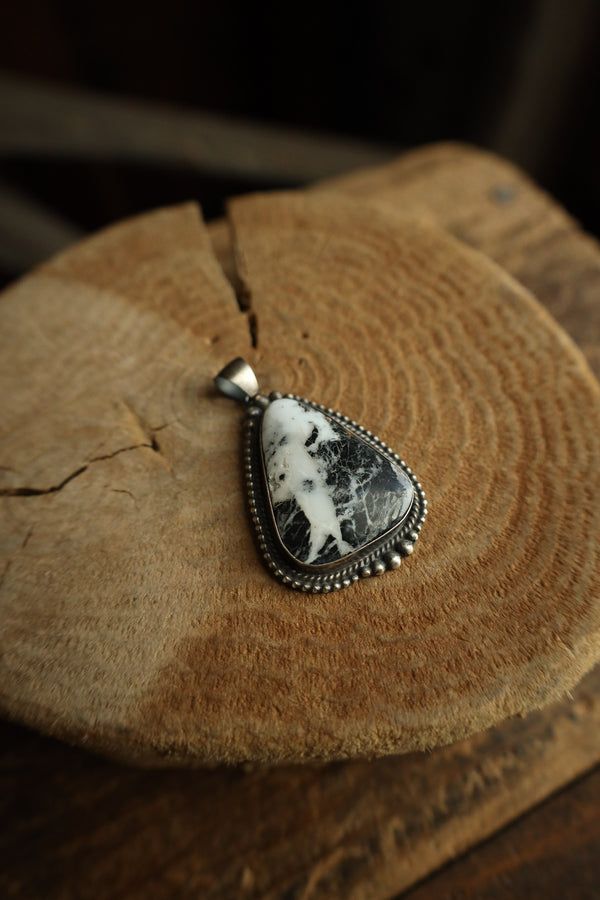White Buffalo Triangle Pendant