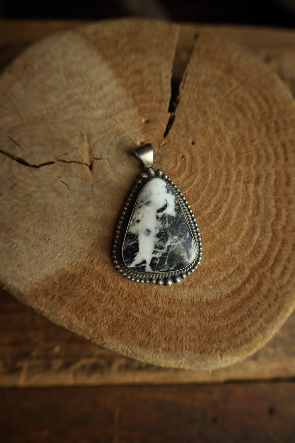 White Buffalo Triangle Pendant