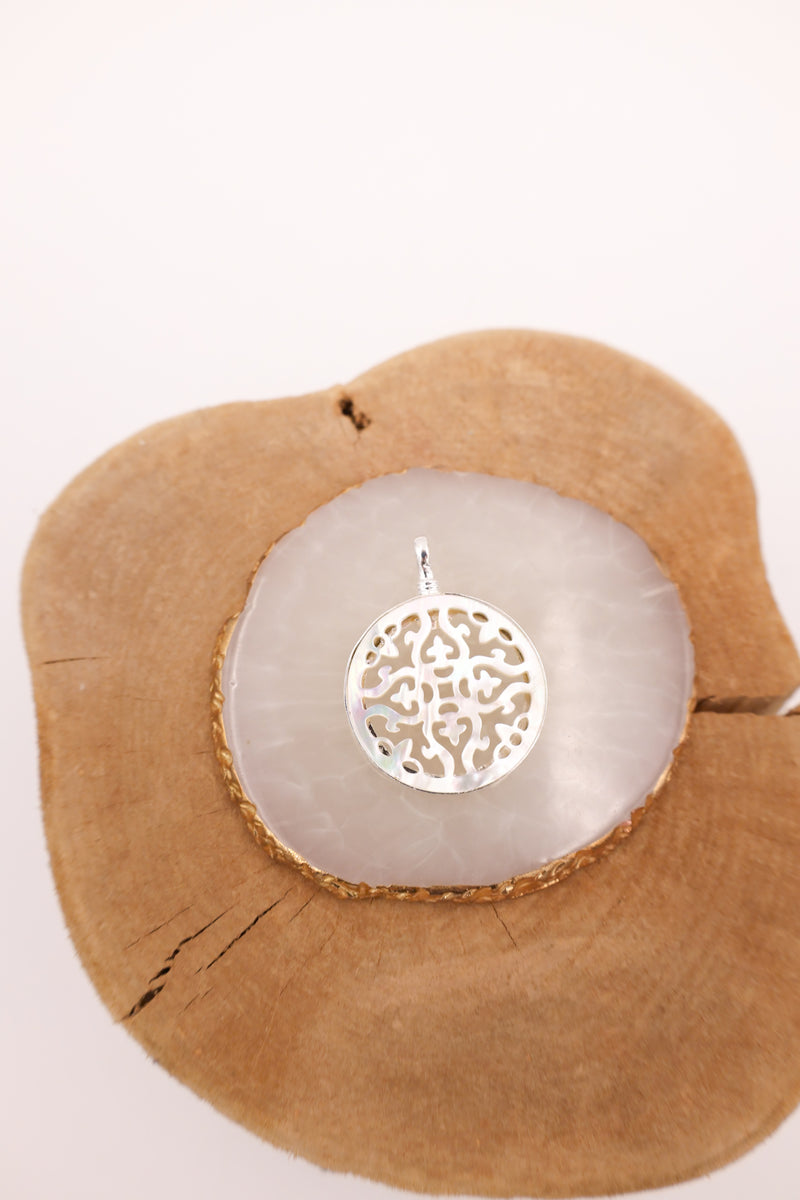 CUT-OUT MOTHER OF PEARL ROUND PENDANT