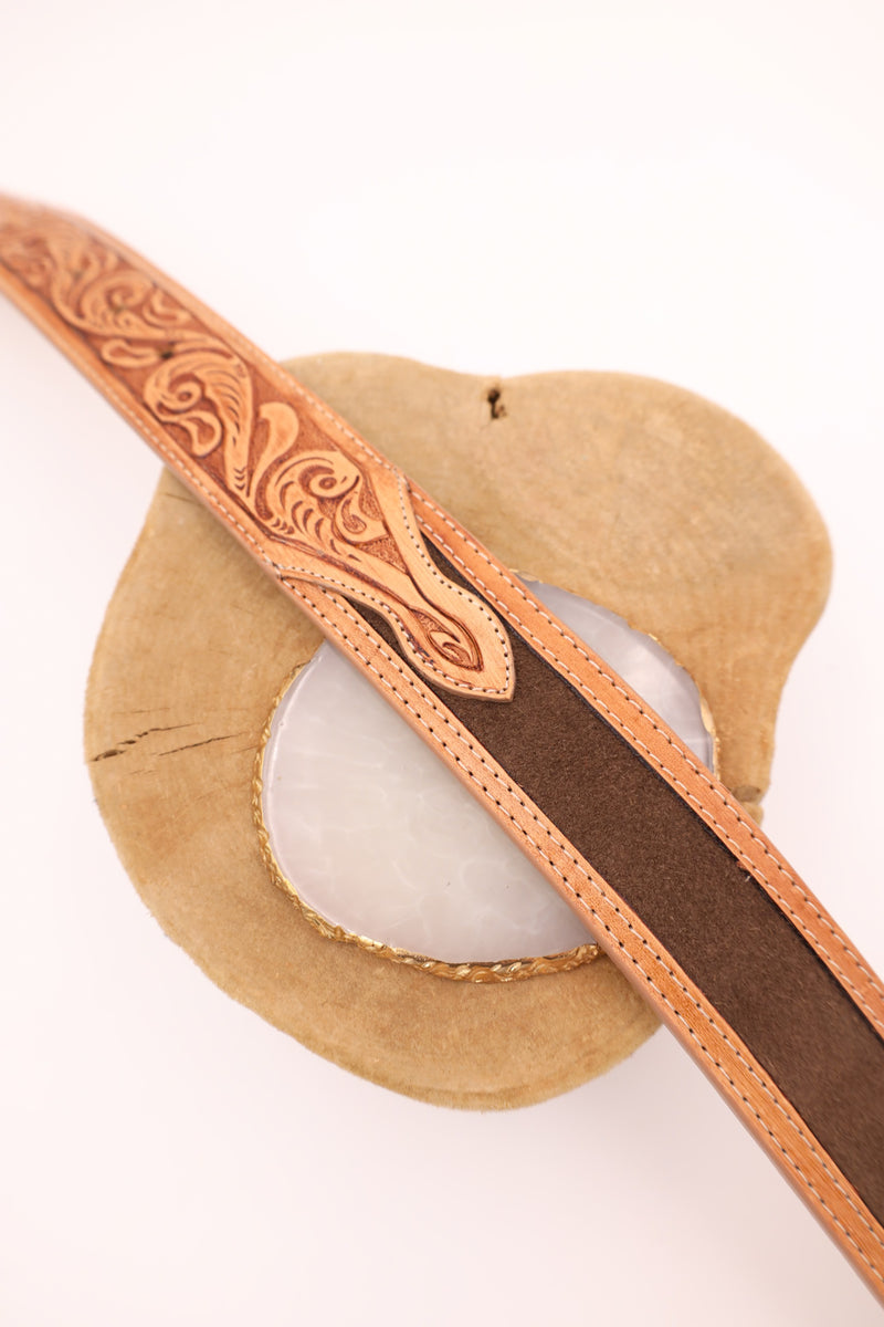 R. Watson Men's belt with leather floral tooling on the front and brown suede on the majority of the back of the belt. The brown suede is bordered with tan leather