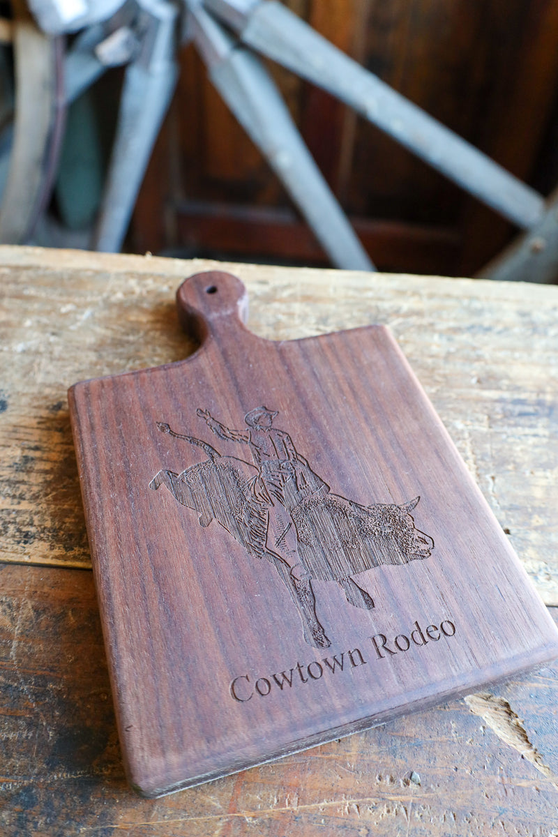 BULLRIDER COWTOWN RODEO 9X6 WALNUT BOARD