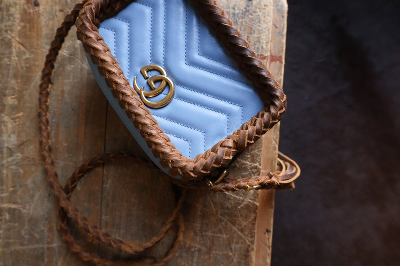 Leather And Vodka enhanced Blue Matelasse Marmont Gucci Braided Handbag with fringe embellishments.