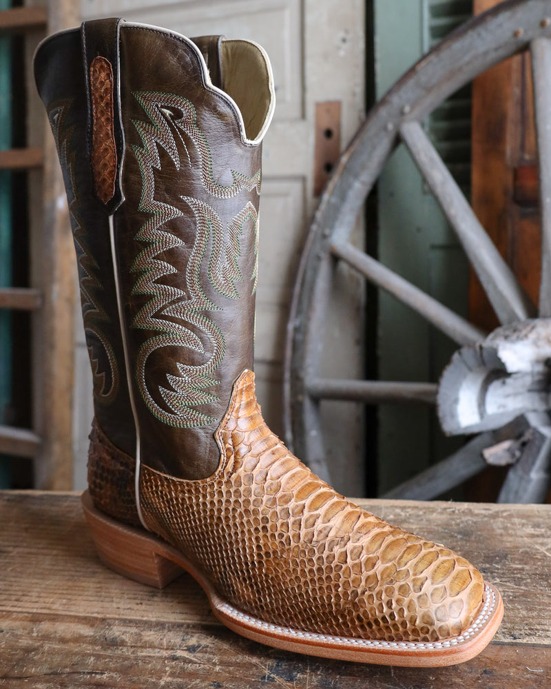 original tobacco python cowboy boots The Rowdy "Tobacco" hasn't been out that long and we're already down to the last sizes. Make sure to snag your pair before it's too late! , Rowdy Tobacco, Available now in store and online!, 2535 Made from genuine python skin Stetson Ember Python Snip Toe