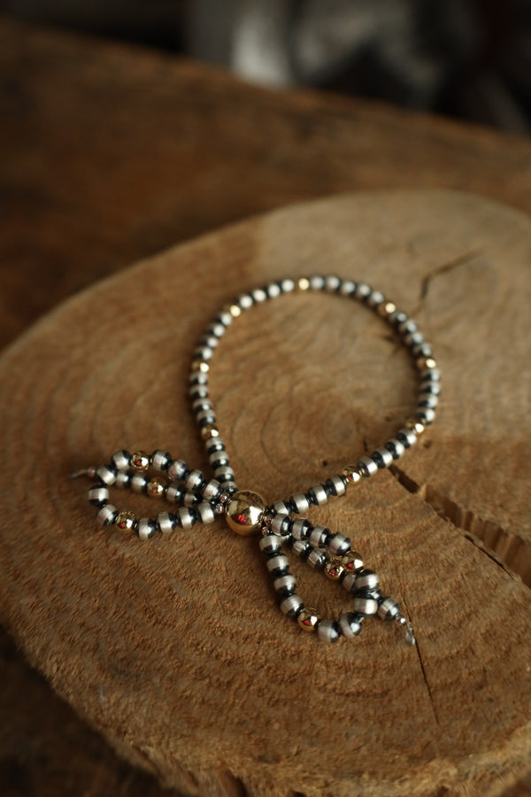 Navajo Pearl Bow With 14K Golf Filled Bracelet 