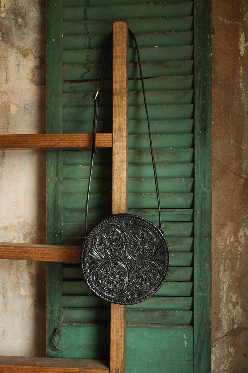 Round tooled leather purse in black 