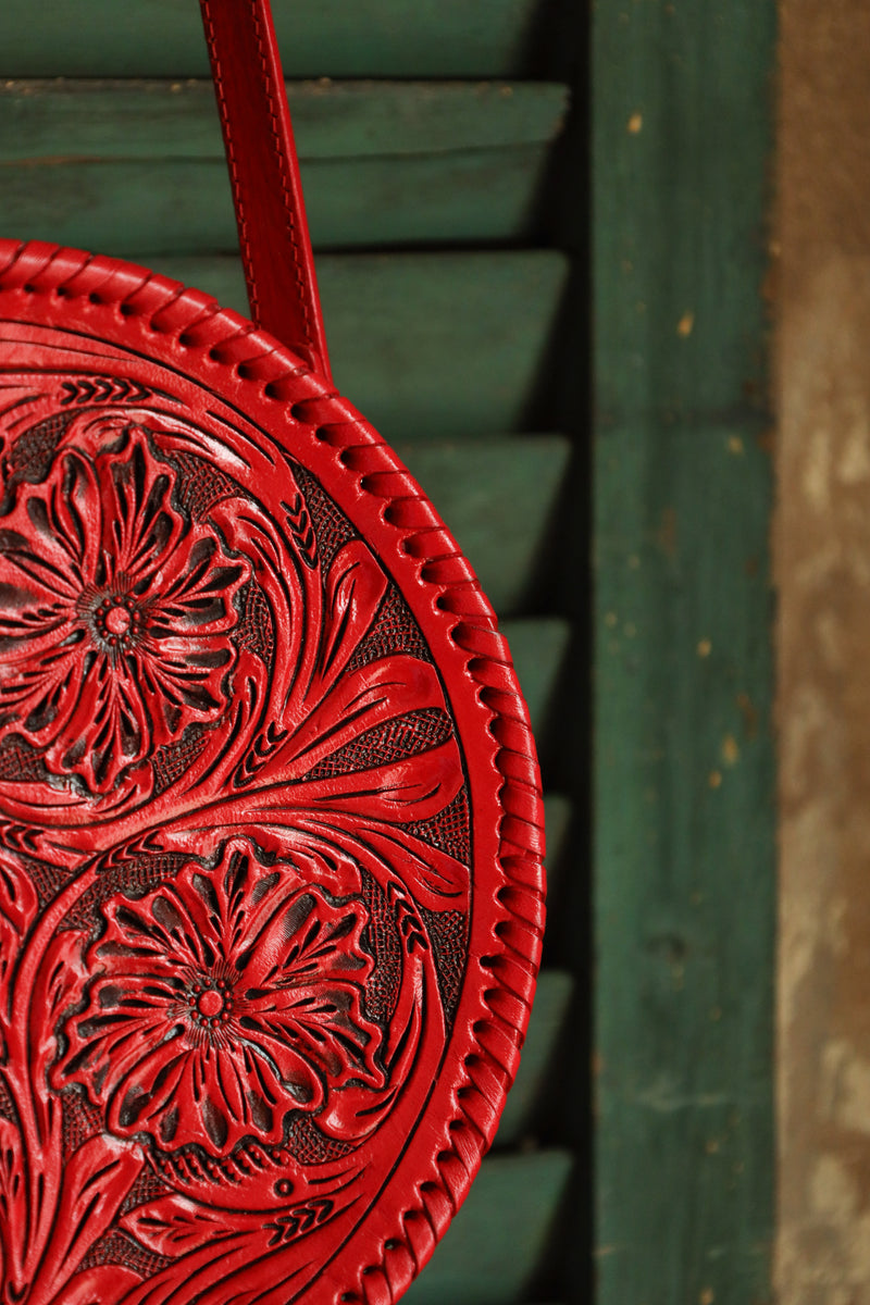 Round red tooled leather purse