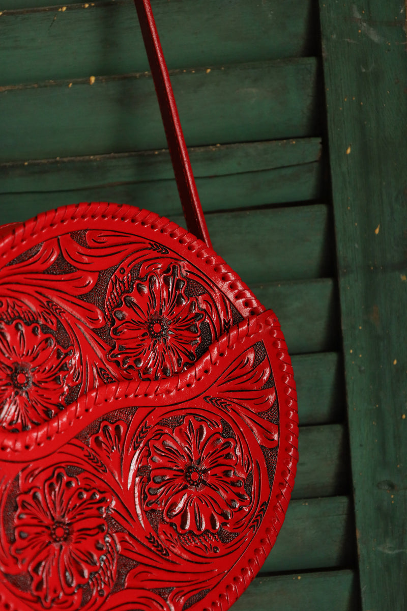 Round red tooled leather purse