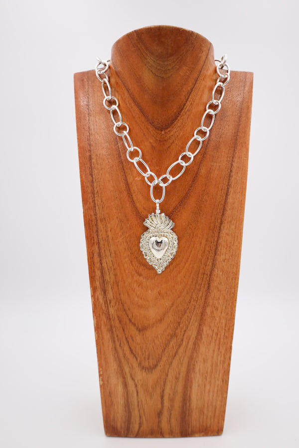 Silver heart with crown pendant