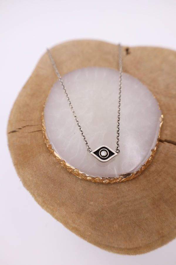 Sterling silver chain and eye .05 carat natural diamond 